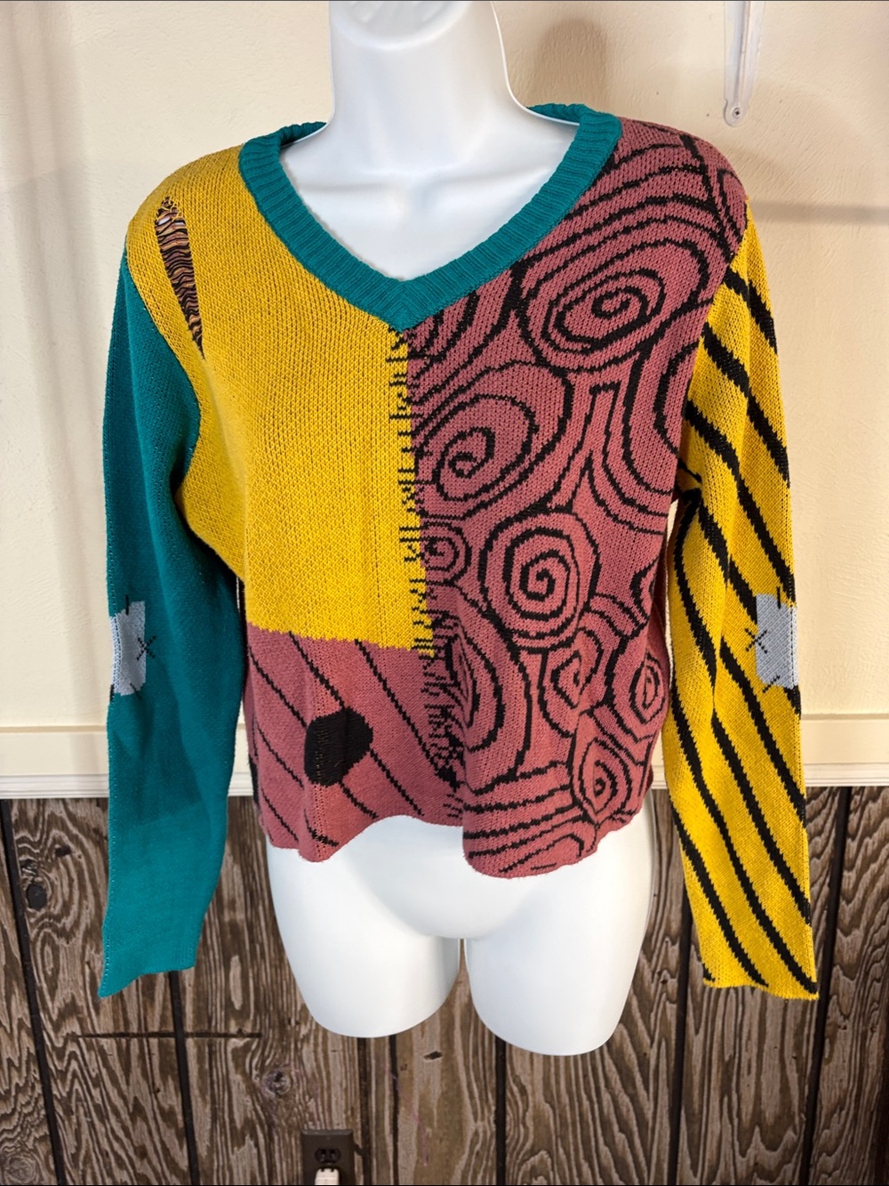 Disney Colorblock V-Neck Sweater in Teal, Mustard & Dusty Pink